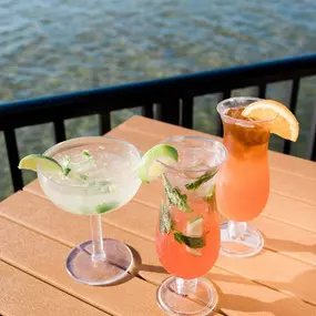 Our signature mojito, Strawberry Mojito and infamous Rum Runner on our outdoor deck!