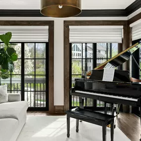 Sheer shades filter natural light into a soft ambiance and bring understated elegance to summer interiors.