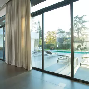Upgrade to smart living with motorized window treatments. Control your blinds, shades, and drapes with a remote, app, or voice assistant—for everyday comfort, made effortless.