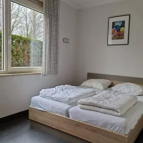 Bild von Ambachtelijk gebouwd huisje aan de kust van Baarland - Belvilla by Oyo