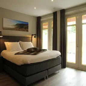 Bild von Luxe duinvilla in Noordwijk met zwemvijver - Belvilla by Oyo