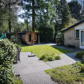 Bild von Sfeervolle bungalow met sauna en hottub - Belvilla by Oyo
