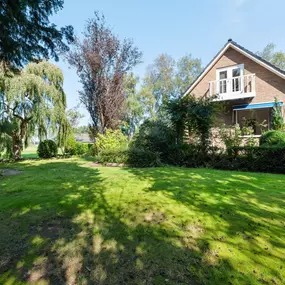 Bild von Gezellig vakantiehuis met eigen tuin - Belvilla by Oyo