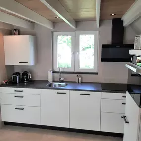Bild von Stijlvol vakantiehuis aan zee - Belvilla by Oyo