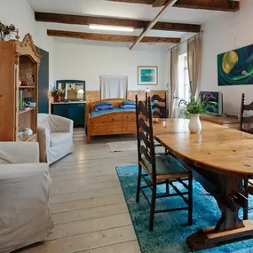 Bild von Karakteristieke kophalsboerderij met roeiboot - Belvilla by Oyo