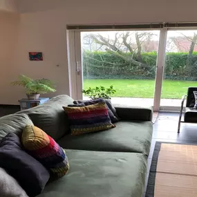 Bild von Sfeervol vakantiehuis vlakbij strand met sauna, hottub en zonnebank - Belvilla by Oyo