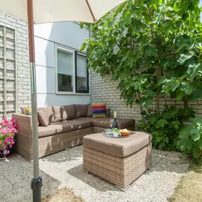 Bild von Sfeervol vakantiehuis vlakbij strand met sauna, hottub en zonnebank - Belvilla by Oyo