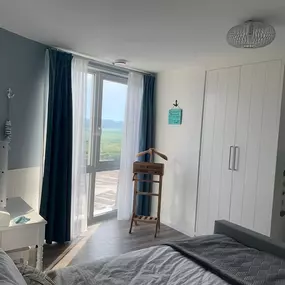 Bild von Stijlvol appartement met zeezicht - Belvilla by Oyo