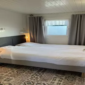Bild von Vrijstaand vakantiehuis met omheinde tuin - Belvilla by Oyo