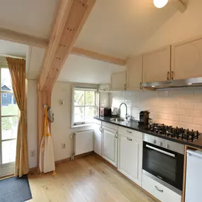 Bild von Leuk vakantiehuis aan de Nederlandse kust met terras - Belvilla by Oyo