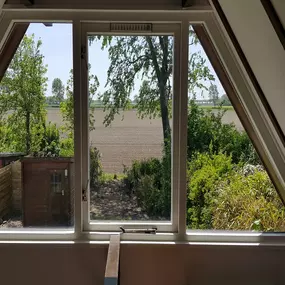 Bild von Huisje met weids uitzicht en tuin op het zuiden - Belvilla by Oyo