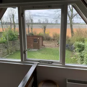 Bild von Huisje met weids uitzicht en tuin op het zuiden - Belvilla by Oyo