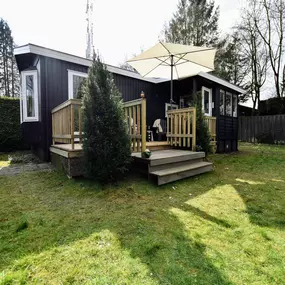 Bild von Sfeervolle chalet op de Veluwe met veranda en omheinde tuin - Belvilla by Oyo