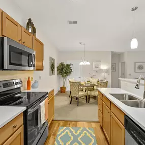 Kitchen with wooden cabinets and sink