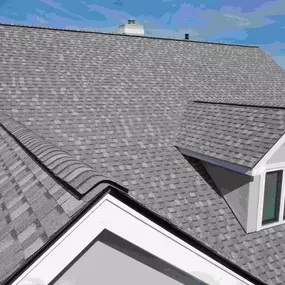 aerial view of newly installed roof on 2 story home