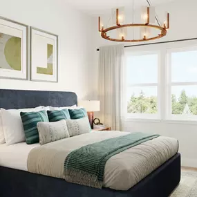 Primary bedroom suite showing chandelier and hardwood flooring