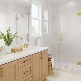 Luxe primary bathroom with dual-sink vanity and shower