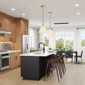 Stunning open-concept kitchen with central island overlooks the casual dining area