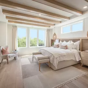 Spacious primary bedroom retreats