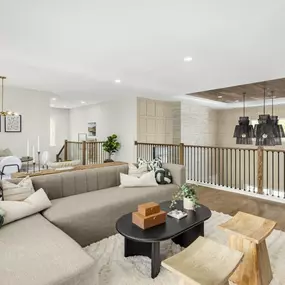 Generous loft spaces overlooking the great room below