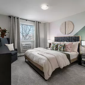 Bedroom with a bed and a window
