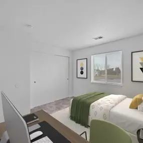 A bedroom with a bed, desk, and chair.