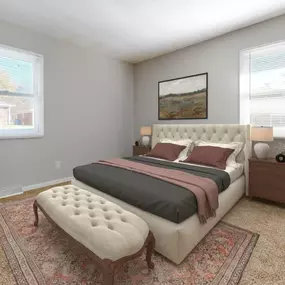 Bedroom with a bed and two windows