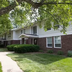 Building with a sidewalk in front of it