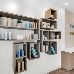 SUGARED + BRONZED Coral Gables Product Shelves