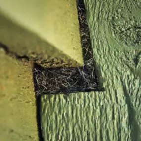 Xcluder rodent control fill fabric inside a common rodent entry point