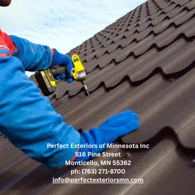Professional roofer installing durable metal roofing panels for long-lasting protection.