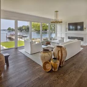 indoor outdoor living room_lake norman waterfront homes_ luxury home renovations_The Ride