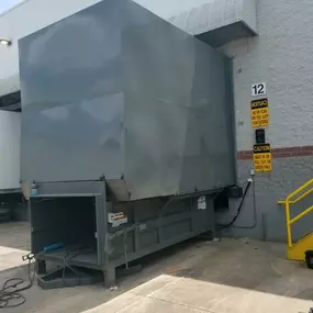 New 3-yard stationary compactor with enclosure
