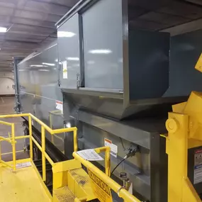 Self-contained Compactor with Hydraulic Dumper