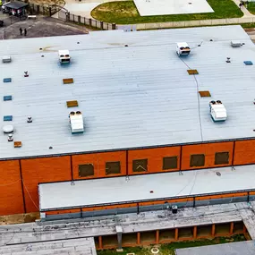 Coleman Roofing and Construction Comeaux High School Commercial Roofing