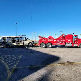 A red heavy-duty tow truck from 