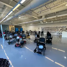Overview of our Elmwood Park showroom floor featuring mobility scooters, recliners, and hospital beds — ready for demo or delivery.