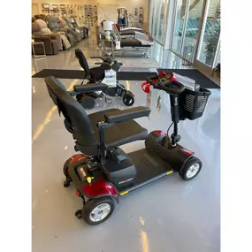 Side-by-side mobility scooters featured at the entrance of our showroom — perfect for in-store test drives before you buy or rent.