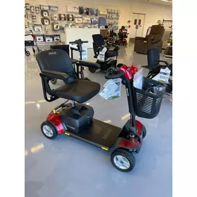 Red and black travel scooters with easy-to-use controls and compact designs — in stock and available for immediate delivery.