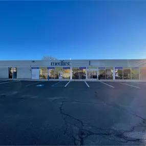 Evening view of the Medfirst Homecare building and storefront, showing clear signage and well-lit access for walk-in customers.