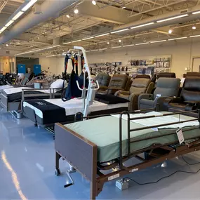 Hospital beds and medical mattresses on display in our Elmwood Park showroom — test in-store before renting or purchasing.