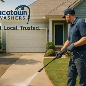 Pressure washing service in Waco, TX performed by Wacotown Washers, showing expert cleaning with visible before-and-after results on a residential driveway