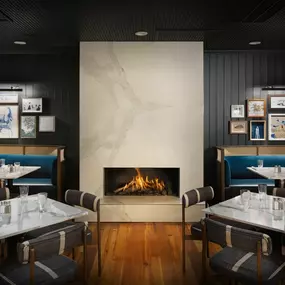 The dining room with a fireplace view at Reel Food & Drinks