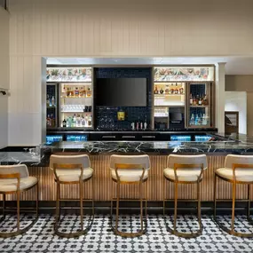 The bar with seating at Reel Food & Drinks