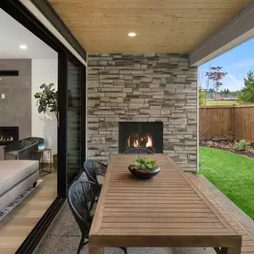 Covered patios with options such as stacking glass doors and fireplaces blend the line between indoor and outdoor living