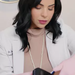 Dr. Kimberly Ayala offering Morpheus8 treatment.