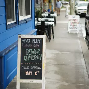 Grand Opening: Analog Promo Board.
