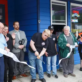Companies Founder performing the Official Ribbon Cutting!