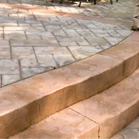 Decorative concrete patio with decorative concrete steps
