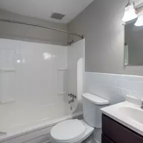 A modern bathroom at Hilton Village Townhomes with clean lines and contemporary finishes.